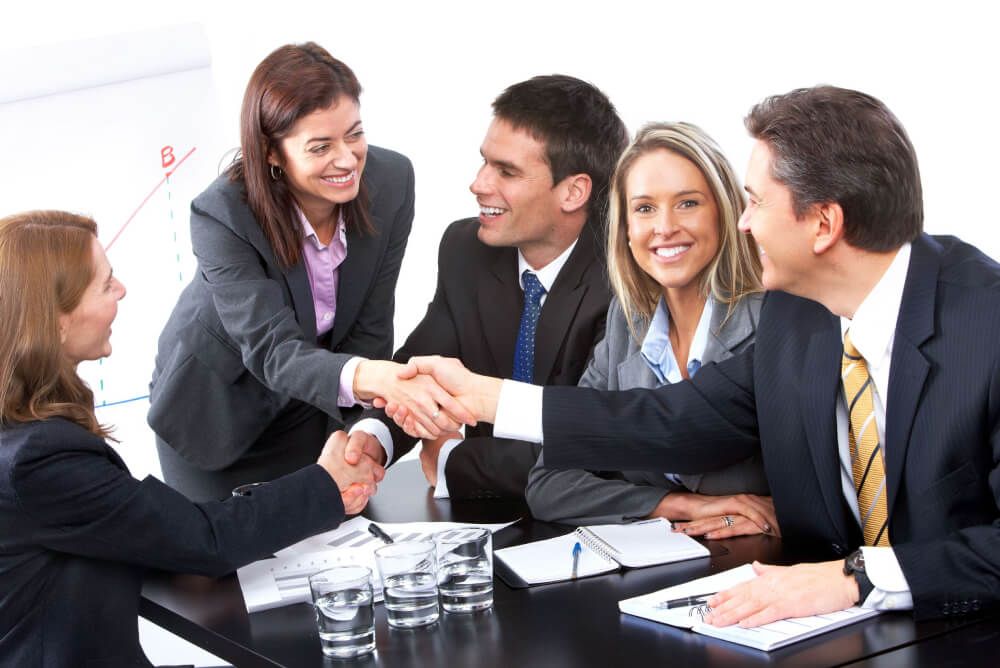 Business owners shaking hands